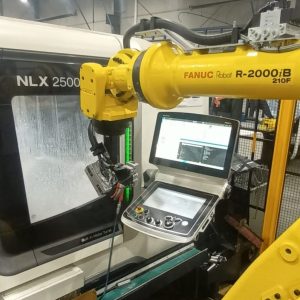 Industrial Robot System: FANUC R-2000iB robot tending an NLX 2500 CNC lathe