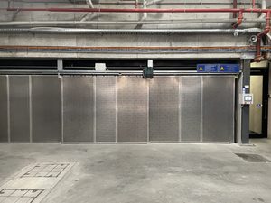 Retrofitted safety gates on Hercules car stacker, Melbourne